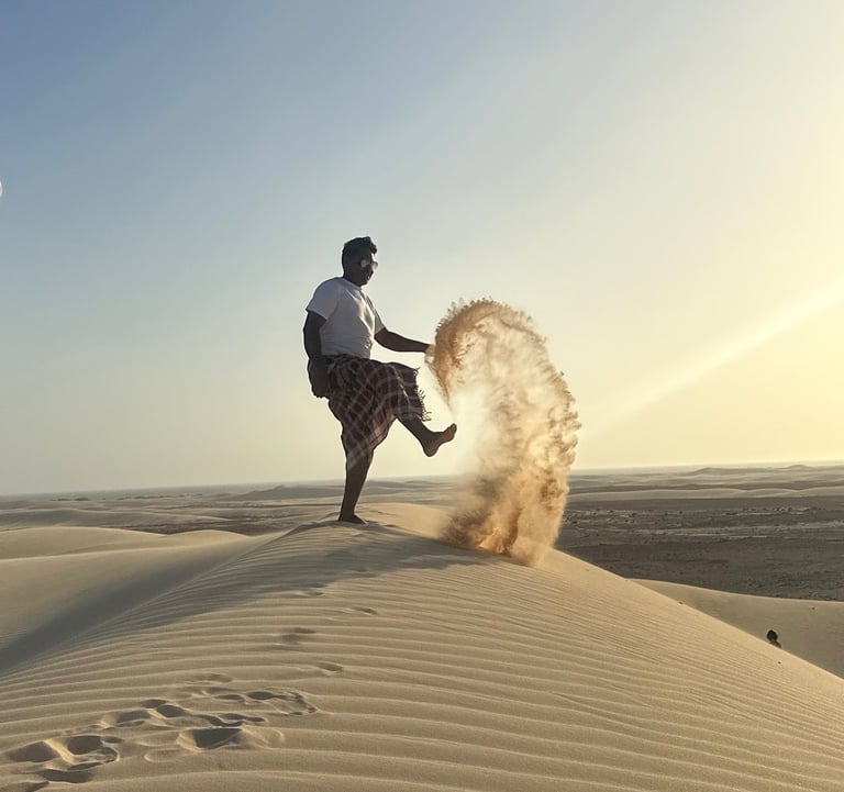 Socotra island tour a man kicking sand