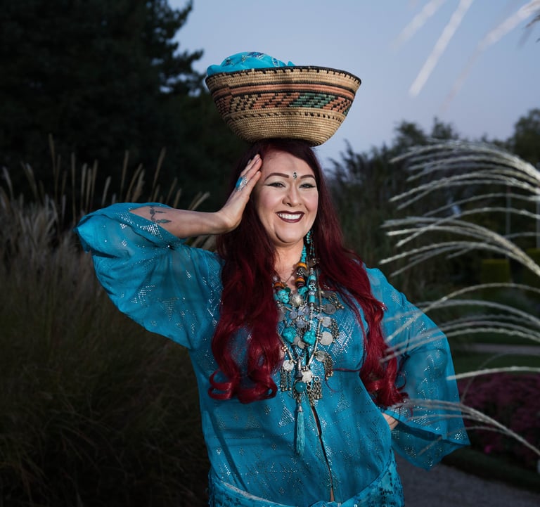 Basket dance with Shahravar wearing turquoise assuit dress