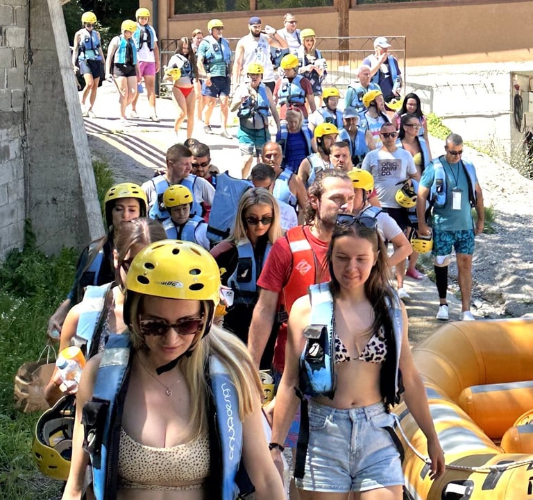 Rafting Neretva guests coming down the hill to enjoy thrilling experience of rafting on Neretva