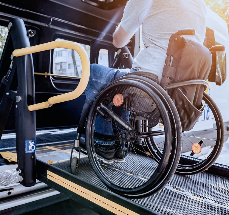 a man in a wheelchair on transport