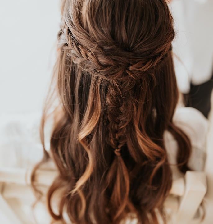 Long hair braided effortless hairstyle with loose fishtail braids