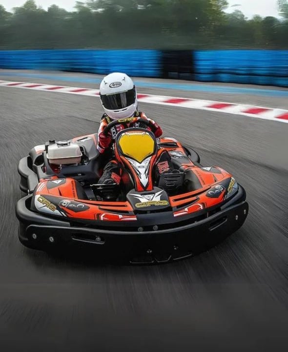 a person riding a bumper car on a track
