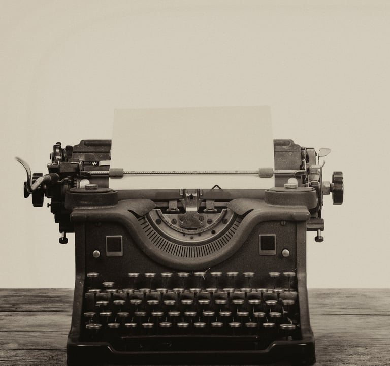 Antique typewriter with script page, symbolizing original screenwriting.
