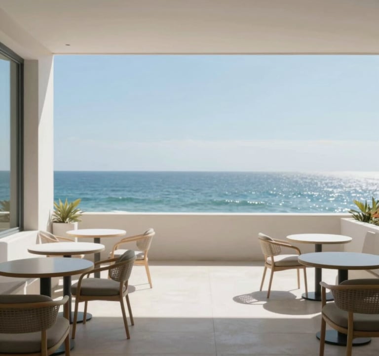 A wide view of a minimalist boutique hotel terrace overlooking the ocean, clean lines, elegant furniture, aspirational and tranquil mood using #A8C9CF.