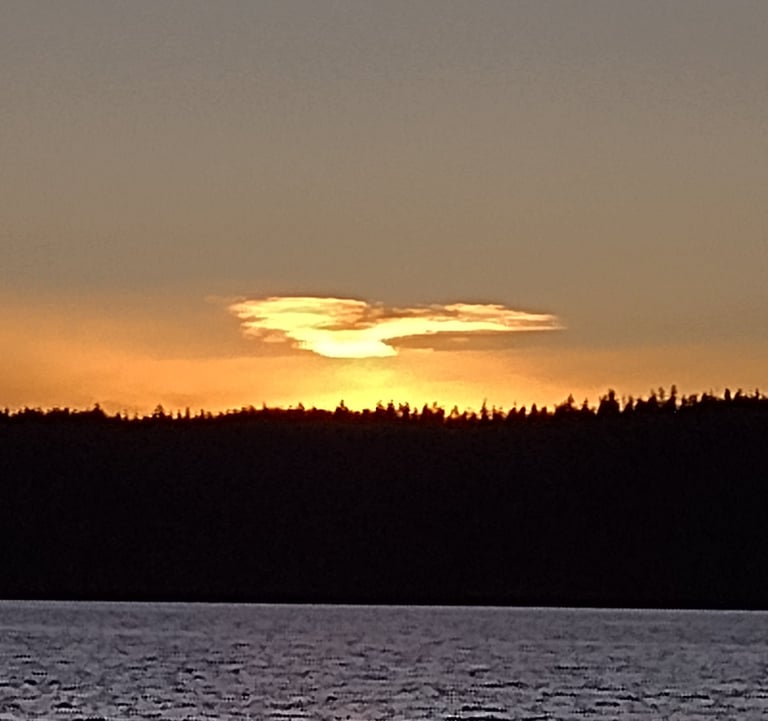 a sunset over a lake