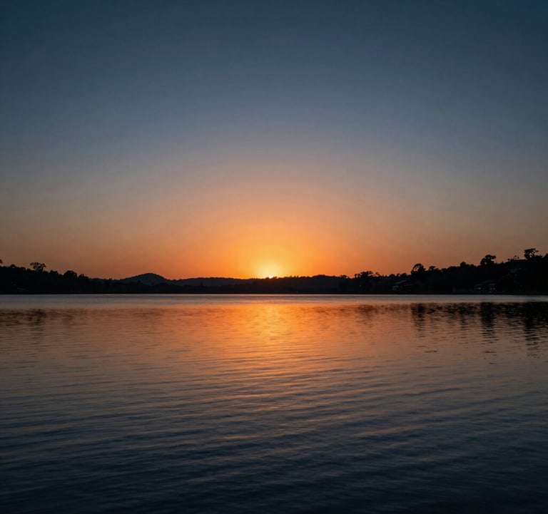 Atmospheric shot of a sunset over the lake in Formosa, Goiás, with dark blue and orange tones, reflecting a premium and calm lifestyle.
