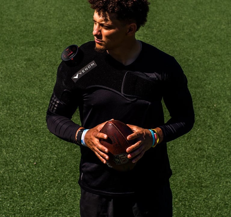 Patrick Mahomes with Venom shoulder heat massager treatment