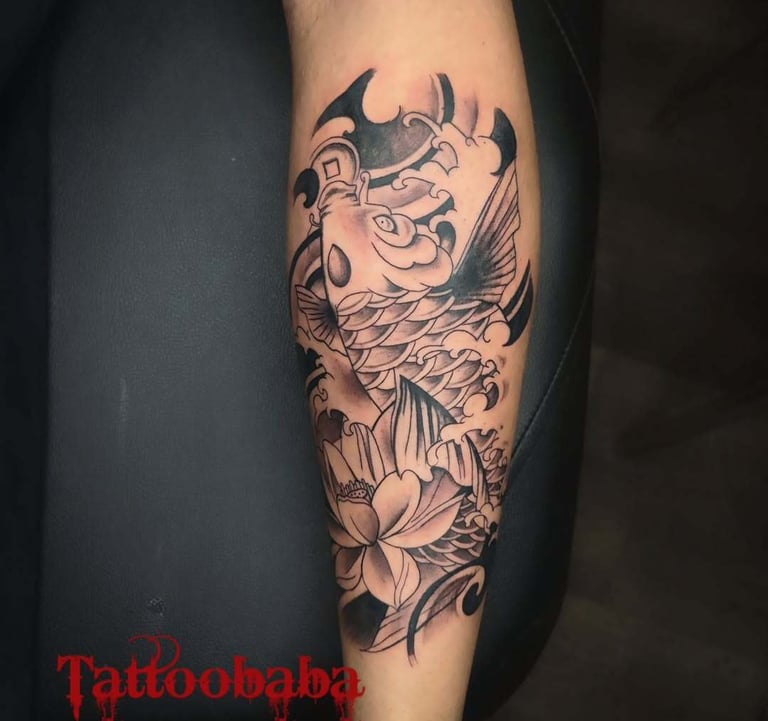 A close-up of a detailed tattoo being inked at Tattoo Baba, showcasing the artist's precision and sk