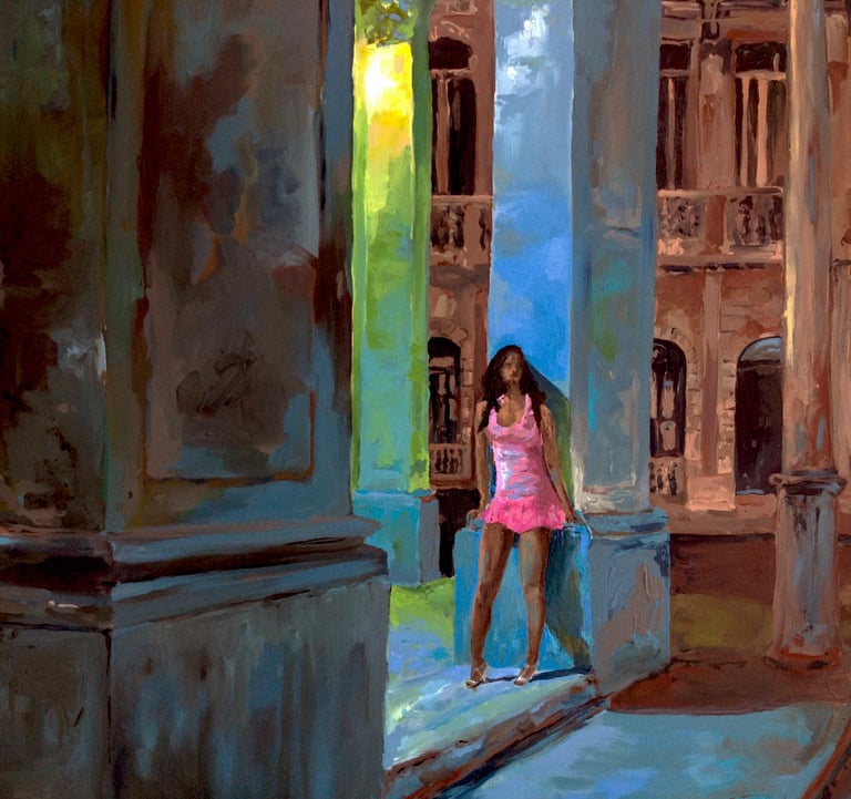 a woman in a pink dress standing in front of a building