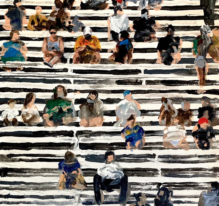 a group of people sitting on a large set of stairs in the stadium