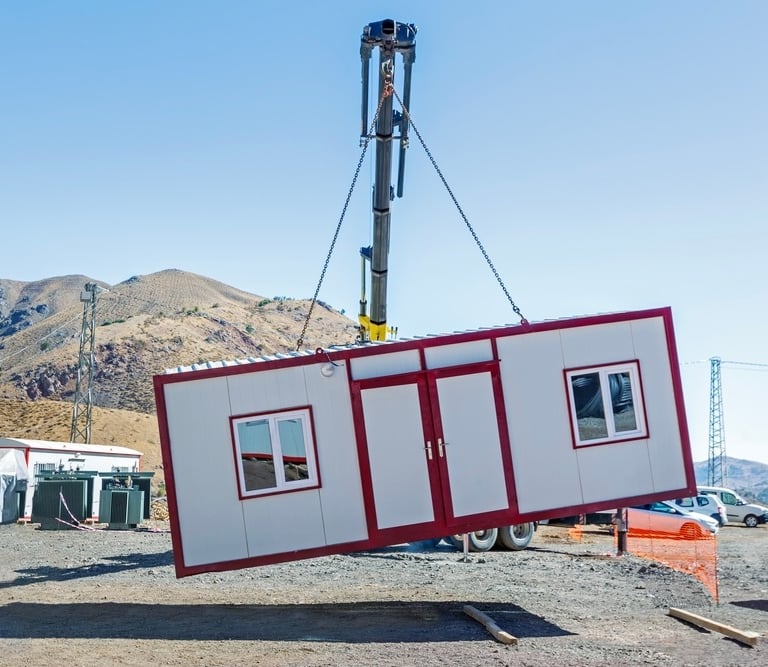 This image shows a high-quality prefabricated porta cabin designed for use as temporary site office.