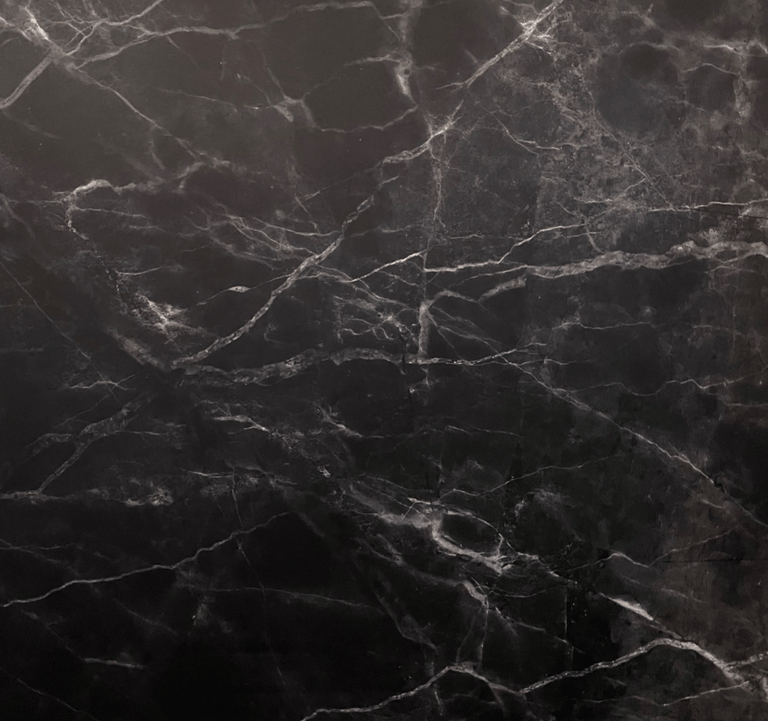 a black marbled surface with a black marbled surface