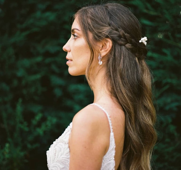 bride with braided hairstyle and long hair photographed by Vitor Gordo wedding photographer