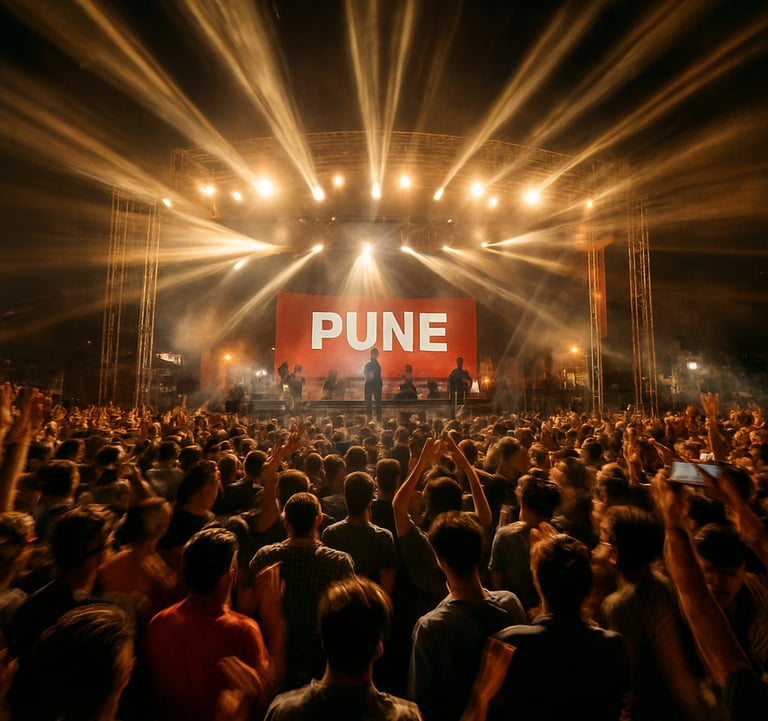 A dynamic, high-energy shot of a grand event in Pune. The composition captures the motion of light and people using a cinematic videography approach, emphasizing the scale and professional production quality.