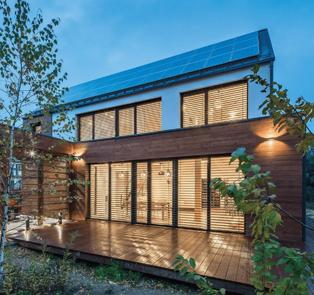 a house with solar panels and solar panels