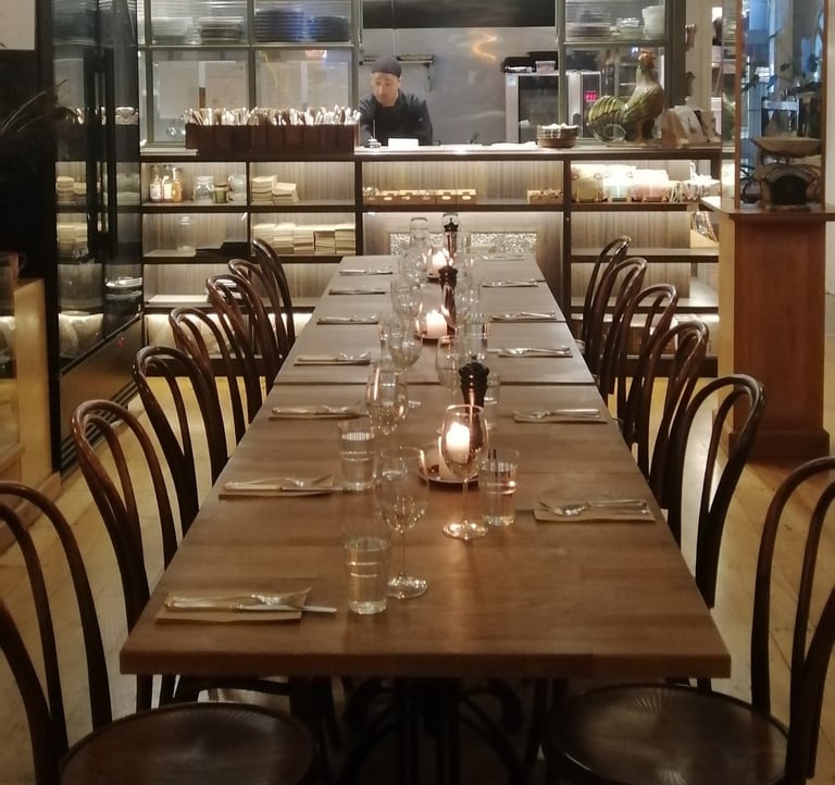 a long table with candles and candles on it