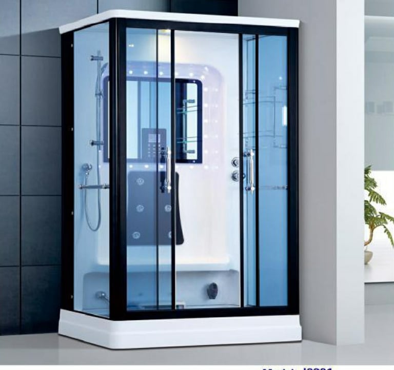 a modern shower room with a glass shower