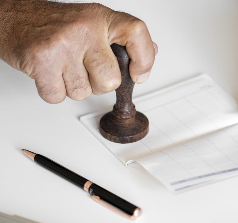 man using rubber stamp 