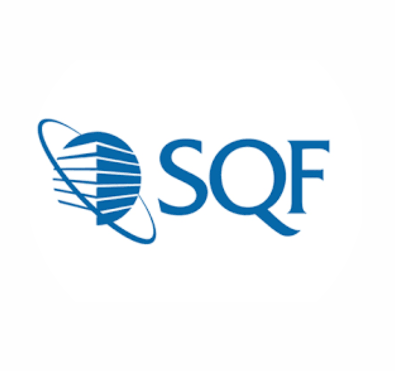 Business owner shaking hands with manufacturer representative, signifying successful partnership.