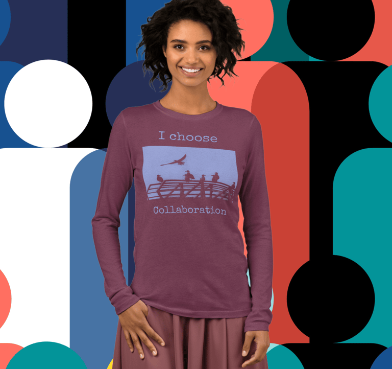 a woman iwearing a long-sleeved t-shirt with illustration of seaguls and text, "I choose collaborati