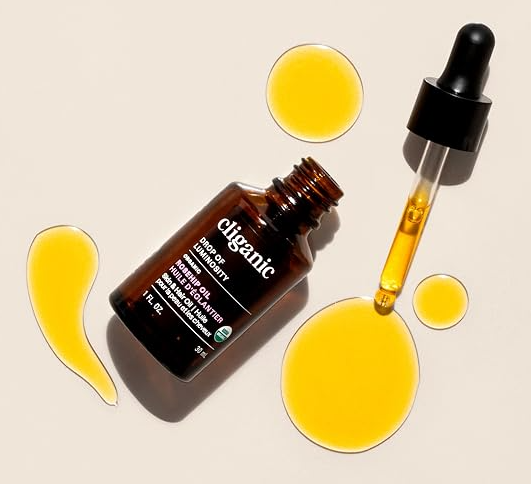 A bottle of Cliganic Organic Rosehip Seed Oil on a white background, USDA Organic and Non-GMO Projec