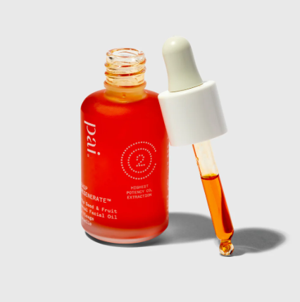 Pai Skincare Rosehip BioRegenerate Face Oil in an amber glass bottle, deep orange antioxidant-rich