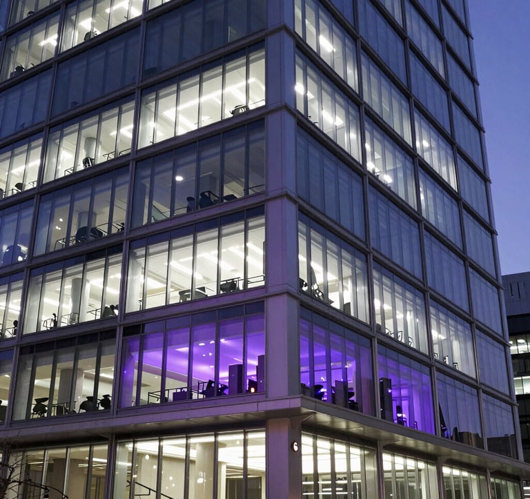 A sharp, high-contrast photograph of a modern tech building at twilight, with glowing white and purple windows reflecting an innovative and sophisticated workspace, North American / Global Professional.