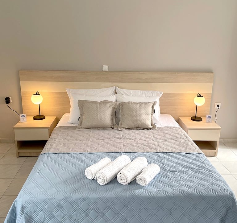 a bed with towels and towels on it