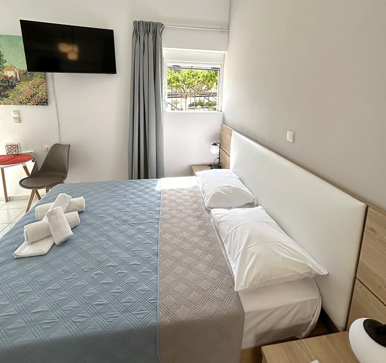 a bed with towels and towels on it