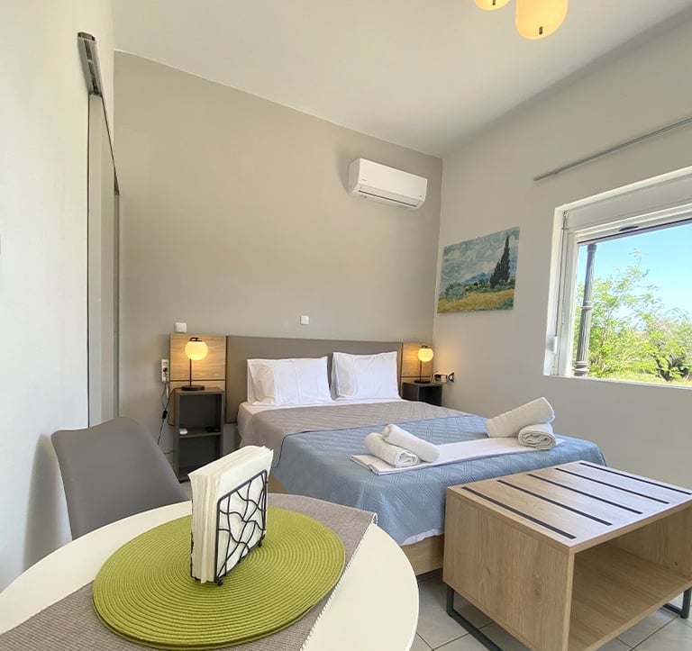 a bed room with a bed and a table