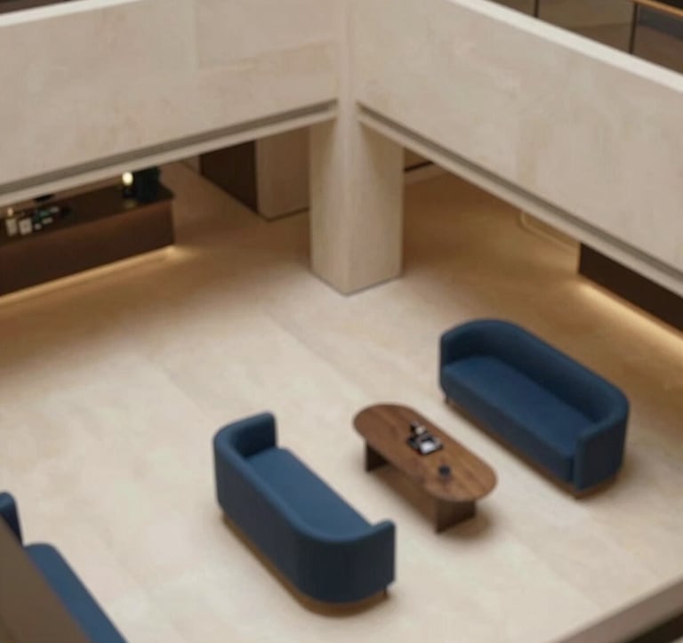 A top-down architectural shot of a minimalist hotel lobby with clean lines and stone textures. The color palette features the sand #D2C9B0 and deep blue #1E2B38 in the furniture details. No people are visible.