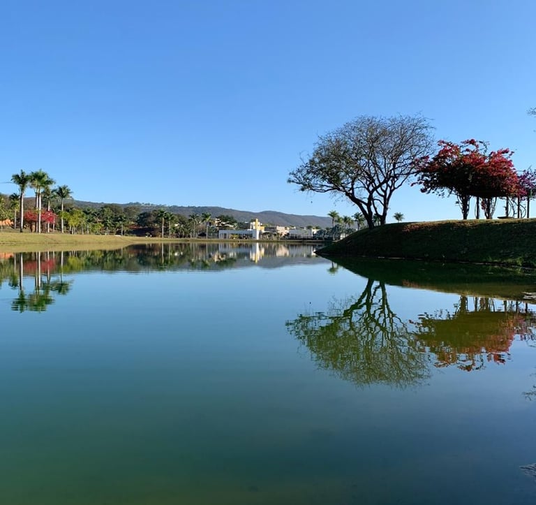a lake with a clock tower in the background