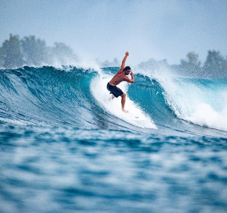 a man surfing on a wave in the ocean