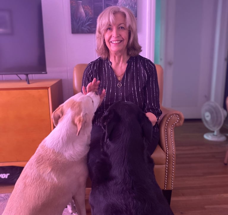 womanwithtwodogsoneblackonewhite