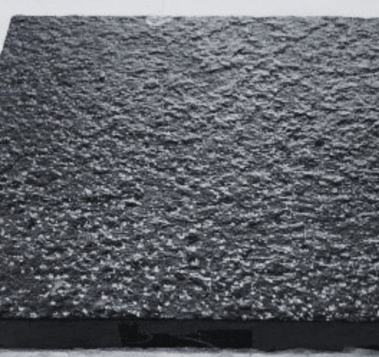 bush hammered finish granite slab