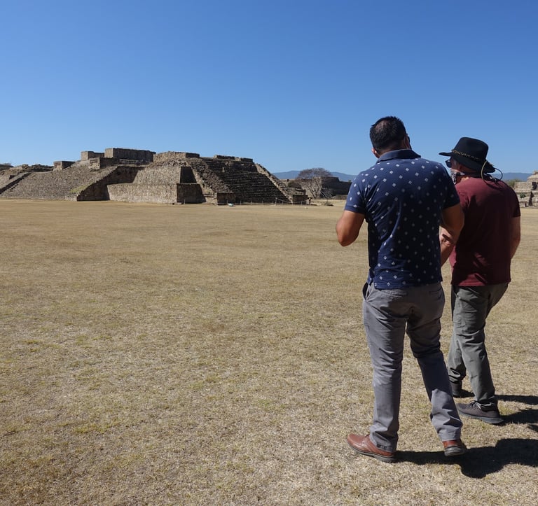 Walking in Monte Alban in front of a pyramid in Oaxaca
