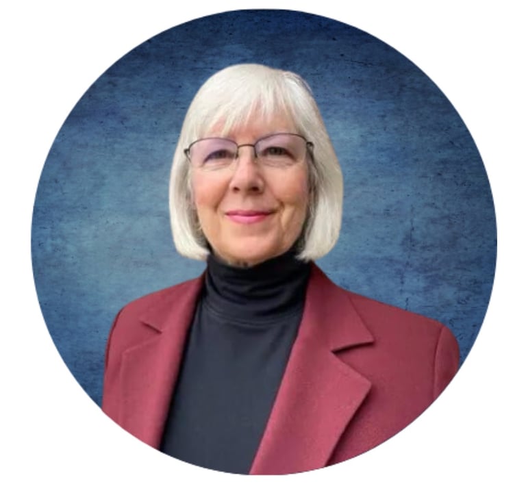 a woman in a red jacket and glasses