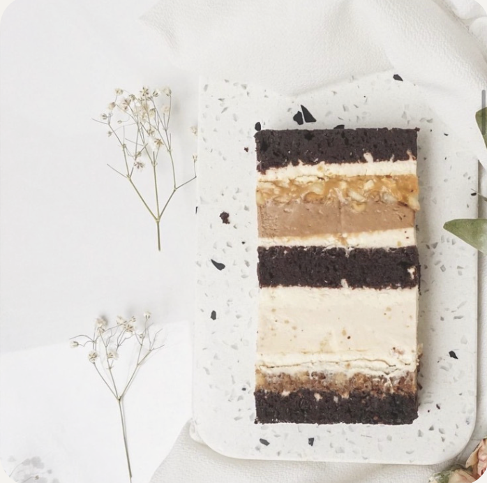 a piece of cake with a slice of cake on a plate