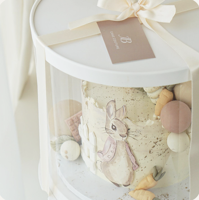 a cake with a bunny on top of it