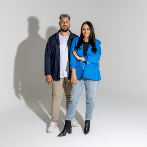 a man and woman standing next to each other the founders of Christian Journal Co
