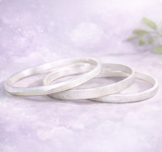 Pure silver bangles handmade by Milo and Lyra from The Artisan Lab Designs