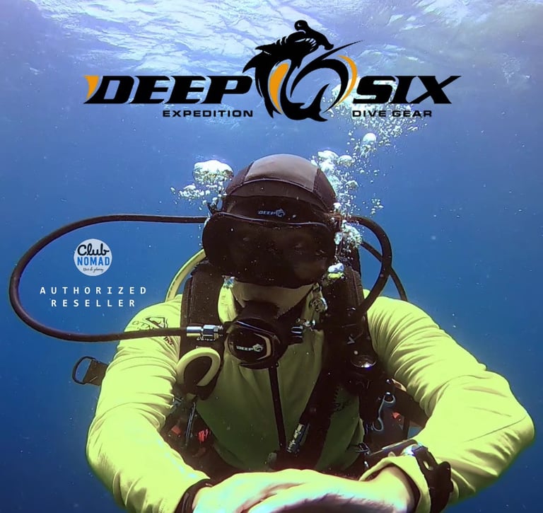 a man in a yellow jacket with Deep 6 scuba diving mask