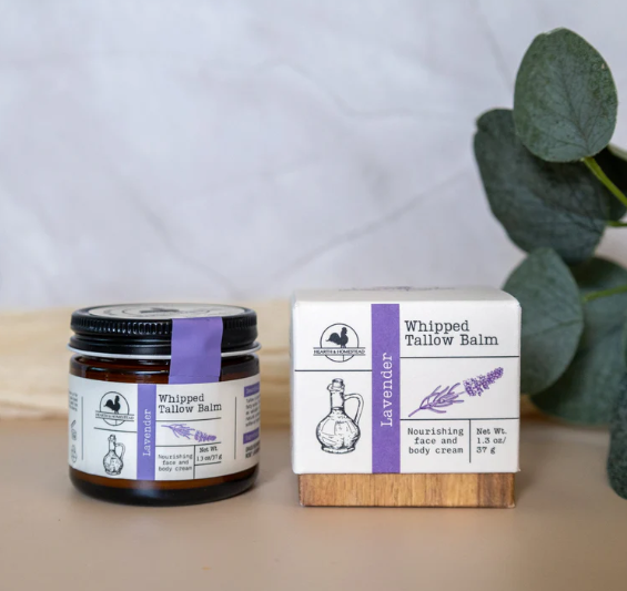 Hearth and Homestead Lavender Whipped Tallow Balm in a glass jar.