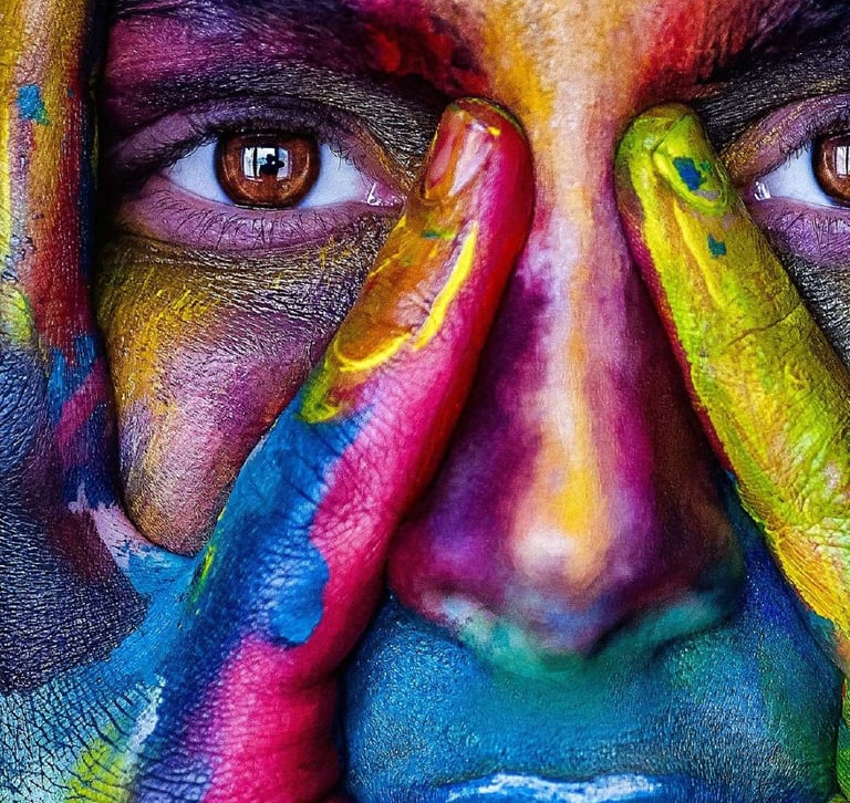 a woman with his hands on his face and painted hands