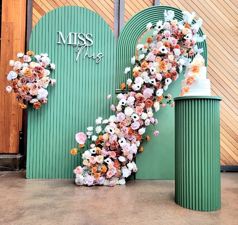 Miss To Mrs bridal shower backdrop in green at a restaurant in Oakvile