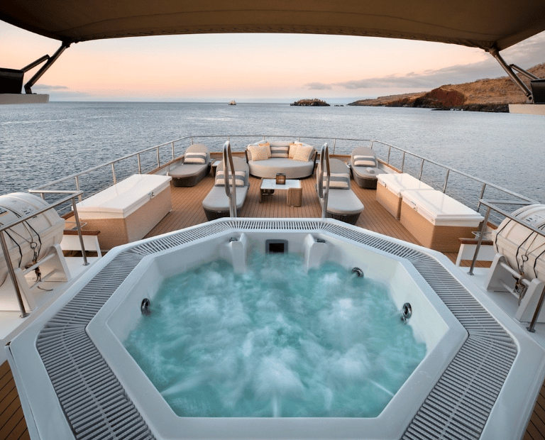Luxury Galapagos expedition yacht watching  from the deck — private cruise