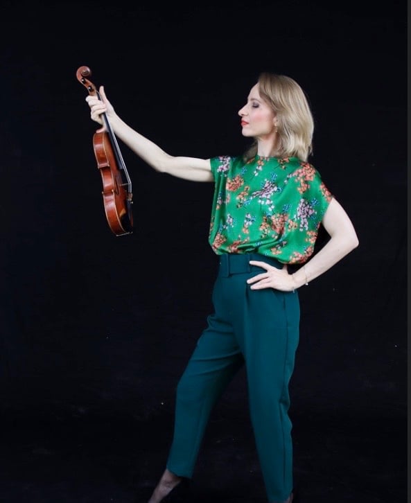 Houston violin teacher with her violin