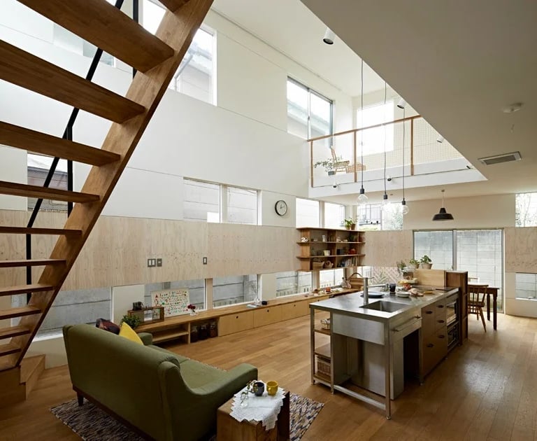 Stylish home interior featuring a custom stainless steel kitchen island and sink by the About SSB team.
