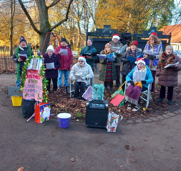 The Choir singing carols in Longford Park