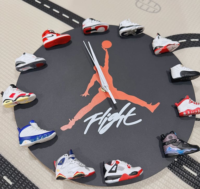 Creative Jordan Jumpman wall clock featuring miniature Air Jordan sneaker models as hour markers.